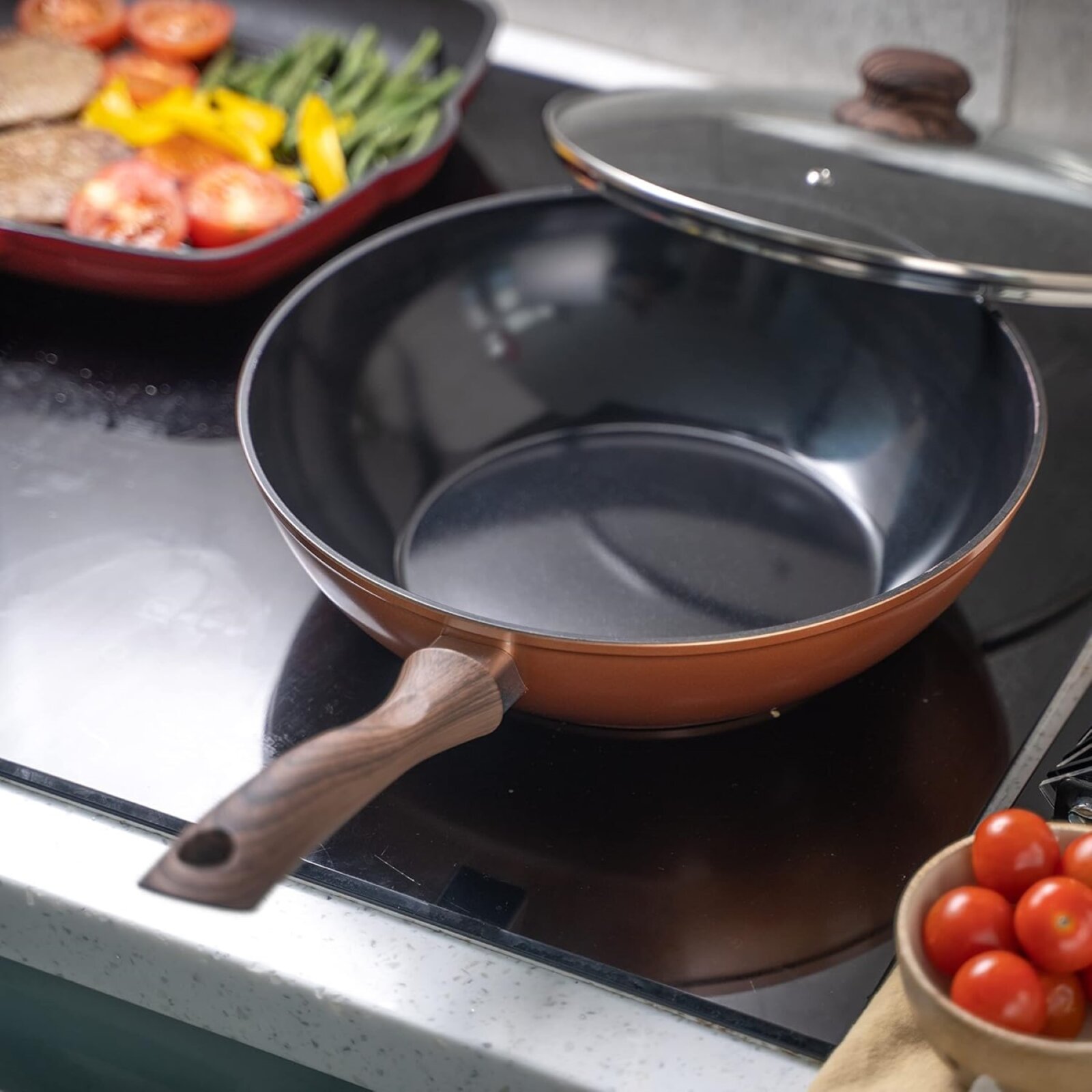 Cast Frying pan with wooden handle and glass lid. 